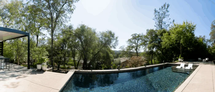 Panoramic view of a custom outdoor living project by Golden Valley Development